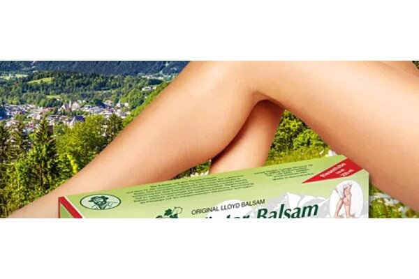 Zobrazenie ženských nôh a alpskej masti, v pozadí je horská krajina.